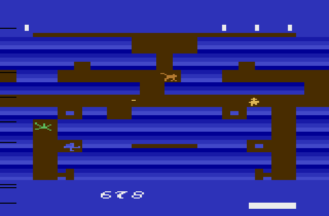 Tutankham Atari 2600 Screenshot: The maze gets tougher with more deadly creatures...