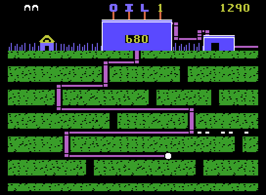 Oil's Well ColecoVision Screenshot: The pipe winds its way towards the bottom of the oil field...