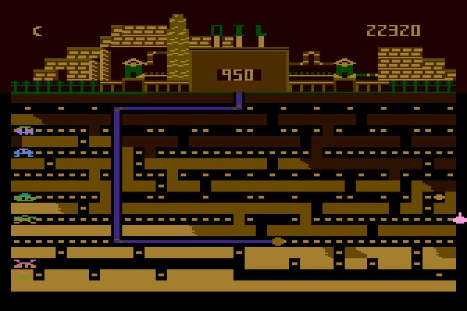 Oil's Well Atari 8-bit Screenshot: Lots of nooks and crannies on this level...