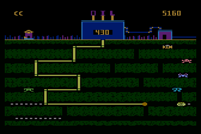 Oil's Well Atari 8-bit Screenshot: My pipe was hit, so it flashes different colors...