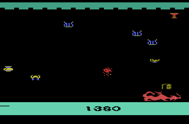 Dragonfire Atari 2600 Screenshot: The red dragon is very quick and tough to avoid!