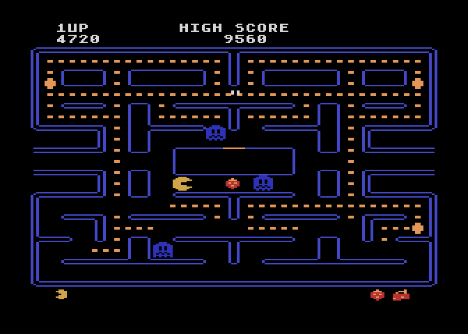 Pac-Man Atari 8-bit Screenshot: Eat the strawberry for bonus points.