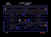 Pac-Man for Atari 8-bit - Eat the strawberry for bonus points.