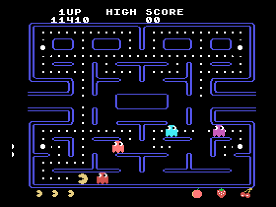 Pac-Man TI-99/4A Screenshot: The red ghost is closing in....