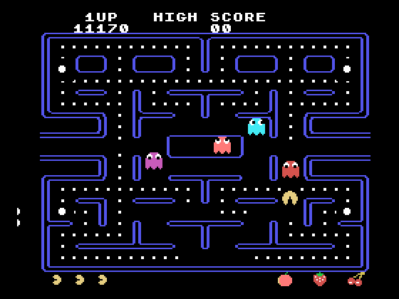 Pac-Man TI-99/4A Screenshot: Running away from a red ghost...