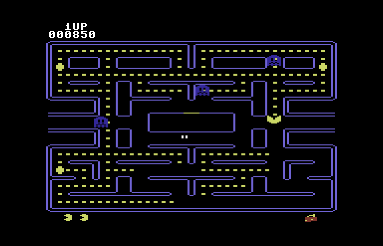 Pac-Man Commodore 64 Screenshot: Try to eat the ghosts for bonus points when they are blue...