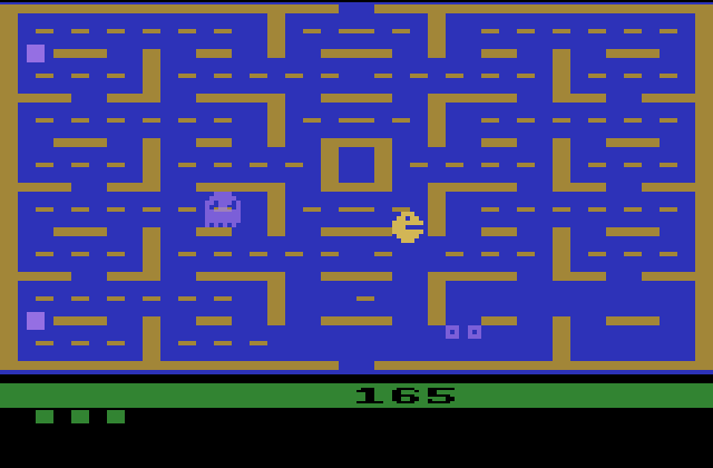 Pac-Man Atari 2600 Screenshot: You can eat the ghosts after eating a power pellet and they turn blue...