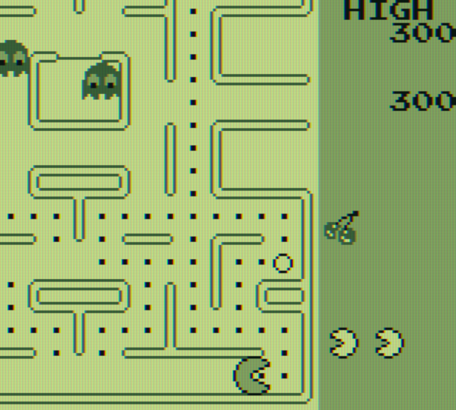 Pac-Man Game Boy Screenshot: Eating dots in the maze...