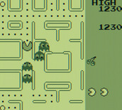 Pac-Man for Game Boy - Racing through the maze with ghosts in pursuit.