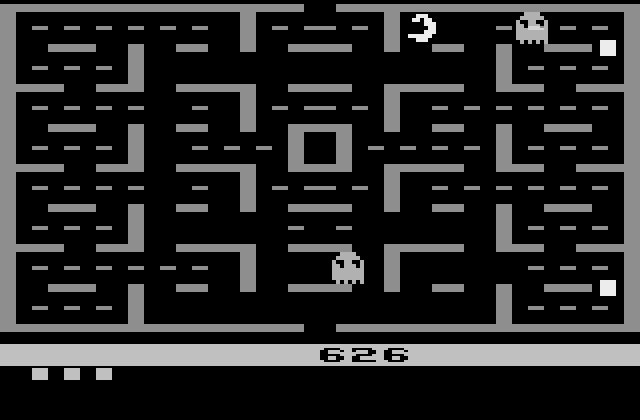 Pac-Man Atari 2600 Screenshot: A ghost is chasing me!