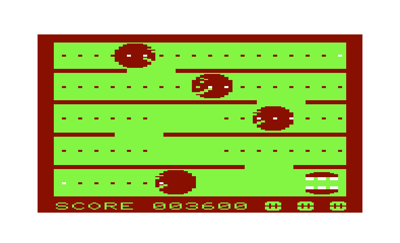 Jawbreaker II Commodore VIC-20 Screenshot: The flashing white dots in the corners allow you to temporarily chase the faces...