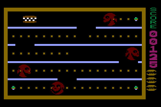Jawbreaker II Atari 8-bit Screenshot: You can eat the faces when they are colored red.