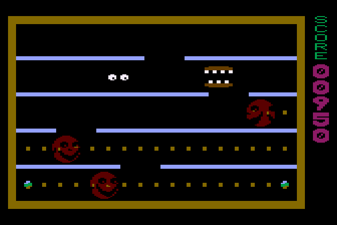 Jawbreaker II Atari 8-bit Screenshot: Like in Pac-Man, faces turn to just eyes after you eat them.