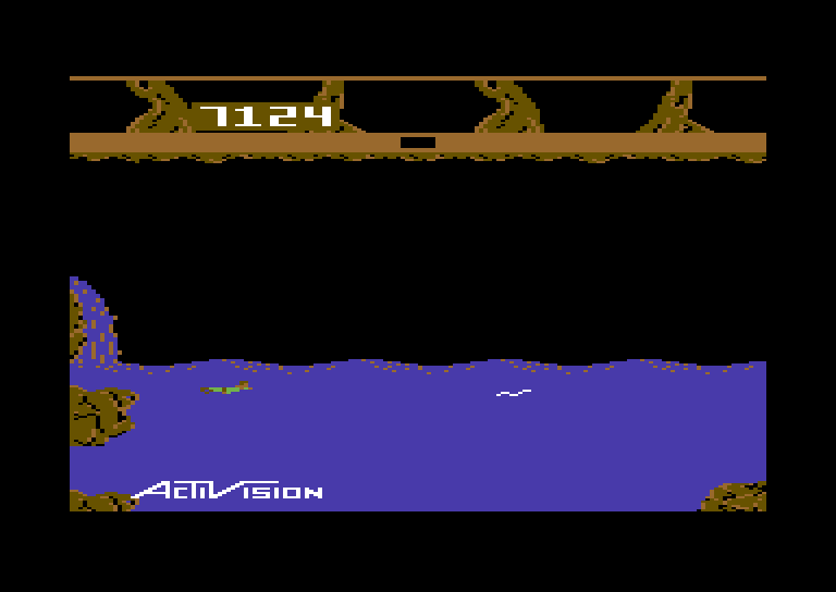 Pitfall II: Lost Caverns Commodore 64 Screenshot: Swam over a waterfall...also, avoid the electric eels...