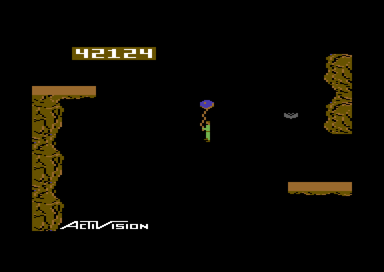 Pitfall II: Lost Caverns Commodore 64 Screenshot: Use a balloon to reach new platforms...