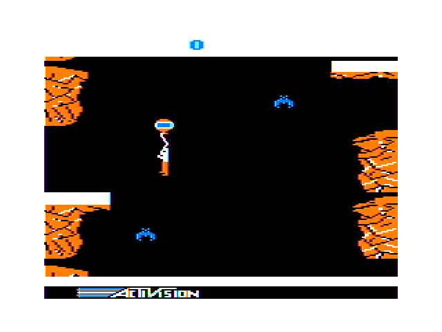 Pitfall II: Lost Caverns TRS-80 Color Computer Screenshot: Floating to an upper platform...