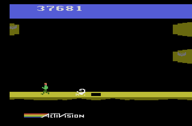 Pitfall II: Lost Caverns Atari 2600 Screenshot: Scorpions follow you and are tricky to jump over.