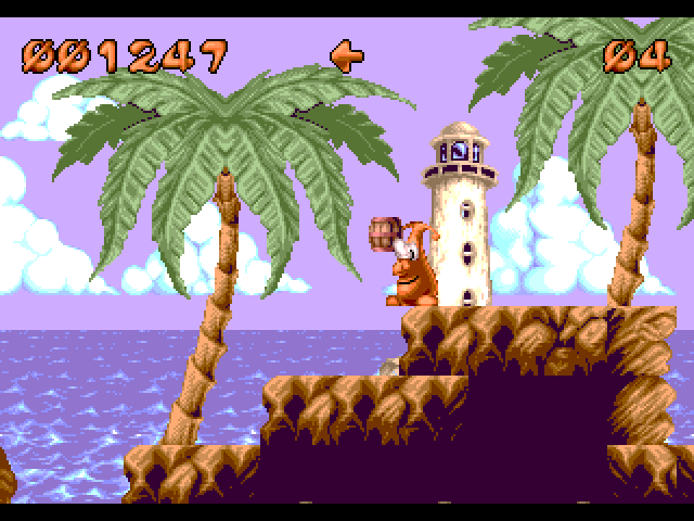 Puggsy Amiga Screenshot: Picking up a barrel...