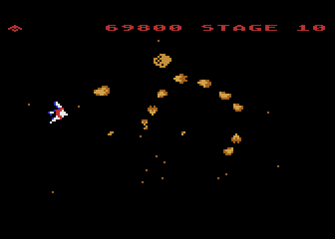 Gyruss Atari 8-bit Screenshot: Enemy formations are different for each leg of the journey.