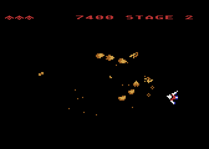 Gyruss Atari 8-bit Screenshot: The players ship can circle the entire screen.