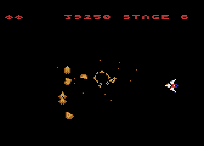 Gyruss Atari 8-bit Screenshot: Sometimes opponents appear from the edges of the screen.