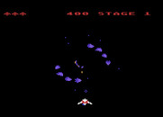 Gyruss for Atari 8-bit - Enemy planes circle the screen...