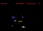 Gyruss for Atari 8-bit - 1000 points for shooting one of these satelites!