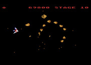 Gyruss for Atari 8-bit - Enemy formations are different for each leg of the journey.