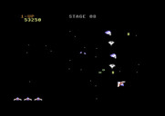 Gyruss for Commodore 64 - Sometimes enemy planes appear from the sides of the screen.