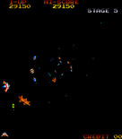 Gyruss for Arcade - Don't crash into enemy planes...