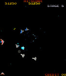 Gyruss for Arcade - Your ship can fly in a circle around the entire screen.