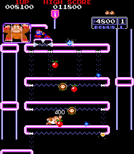 Donkey Kong Junior Arcade Screenshot: You need to zig-zag on these platforms to reach the top.