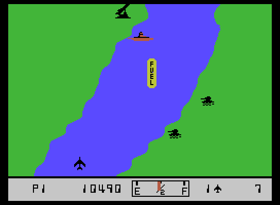 River Raid ColecoVision Screenshot: Enemy tanks on the shore try to destroy you...