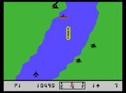 River Raid for ColecoVision - Enemy tanks on the shore try to destroy you...