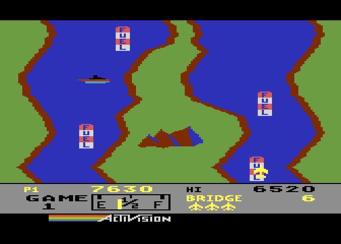 River Raid Atari 5200 Screenshot: Fly over fuel depots to replenish your fuel supply.