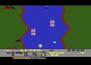 River Raid for Atari 5200 - Tanks on the shore try to destroy you as well...