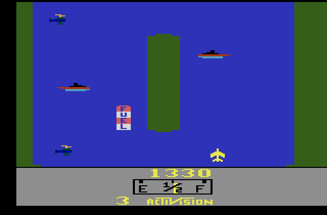 River Raid Atari 2600 Screenshot: Shoot opponents, and fly over the fuel depots to replenish your fuel supply...
