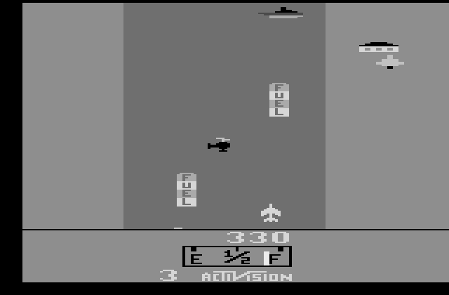 River Raid Atari 2600 Screenshot: Fly over fuel depots for bonus fuel...or shoot them for bonus points.