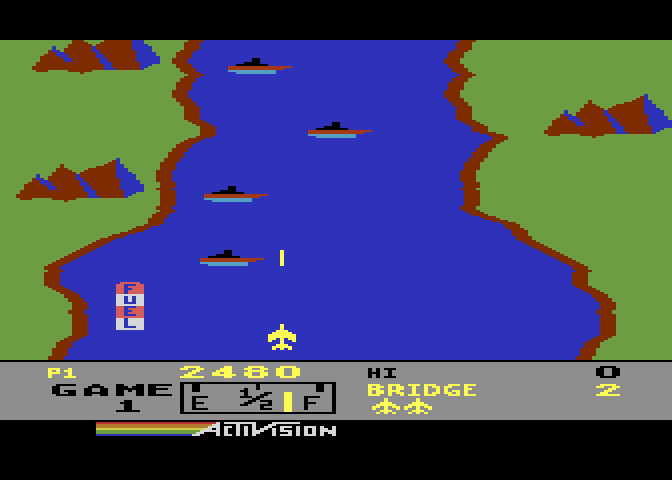 River Raid Atari 8-bit Screenshot: Blasting some boats...