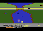 River Raid for Atari 8-bit - Shoot the bridge to get to the next level.