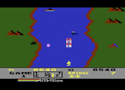 River Raid for Atari 8-bit - Enemy tanks on the shore can cause trouble.