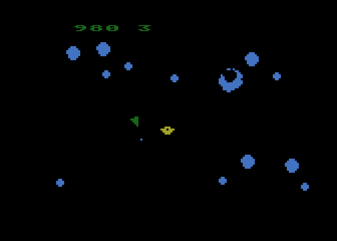 Asteroids Atari 8-bit Screenshot: The asteroids break into smaller ones when you shoot them.