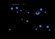 Asteroids for Atari 8-bit - The asteroids break into smaller ones when you shoot them.