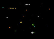 Asteroids for Atari 7800 - Blasting asteroids into smaller pieces...