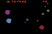 Asteroids for Atari 2600 - When you shoot large asteroids they split into smaller ones.