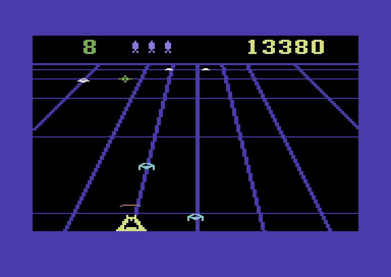 Beamrider Commodore 64 Screenshot: Shoot the blue ships before they become stuck at the bottom of the screen.