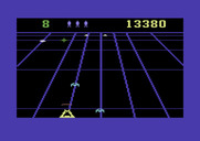 Beamrider for Commodore 64 - Shoot the blue ships before they become stuck at the bottom of the screen.
