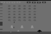 Space Invaders for Atari 2600 - You can also make the game tougher for one of the players by having a larger laser cannon.