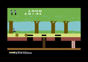 Pitfall! for Commodore 64 - Jumping over some rolling logs.