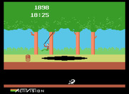 Pitfall! for ColecoVision - Swinging across another pit.